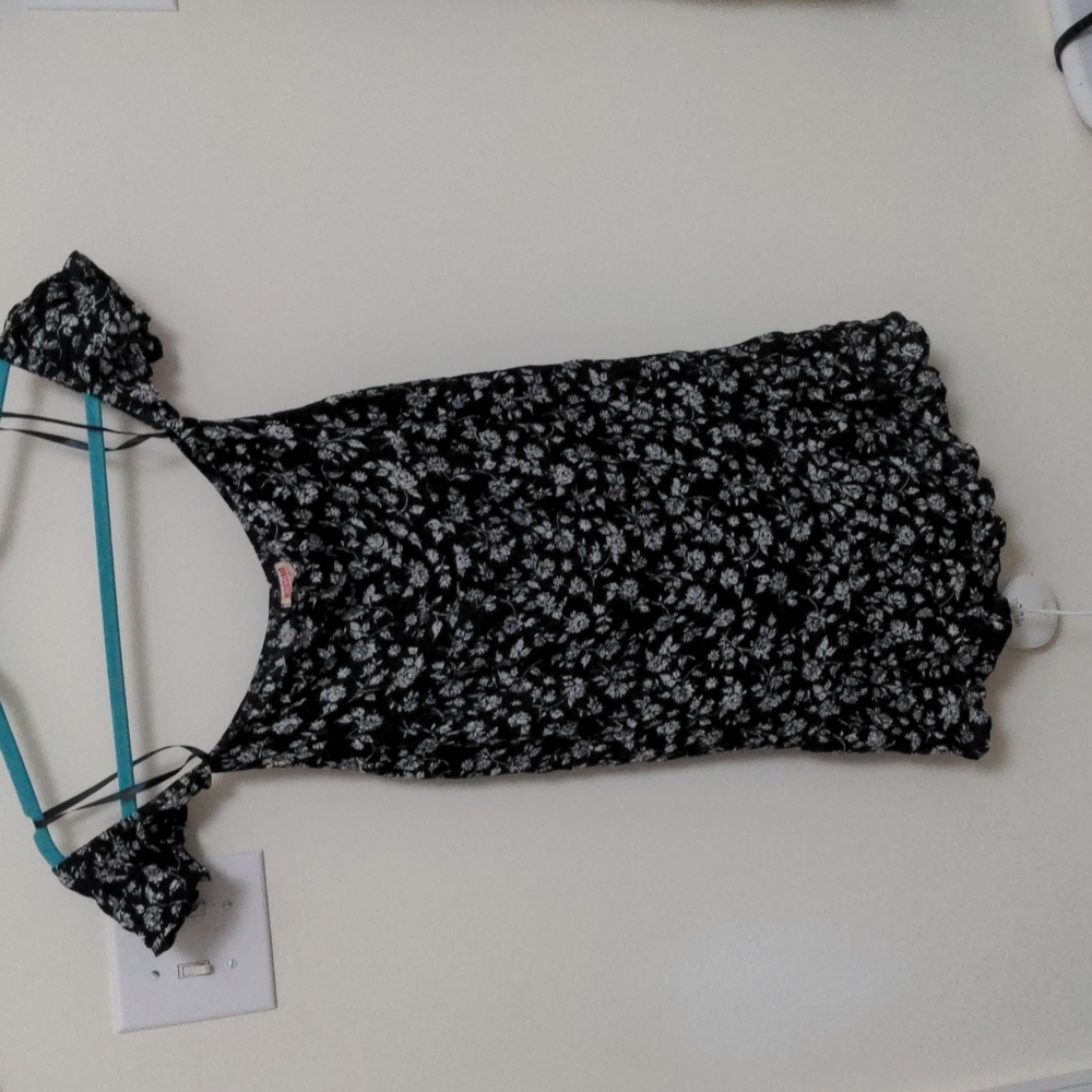 Black strapless dress with white flower detail